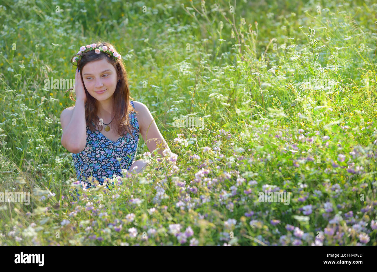 Beautiful teenage girl enjoying nature Stock Photo