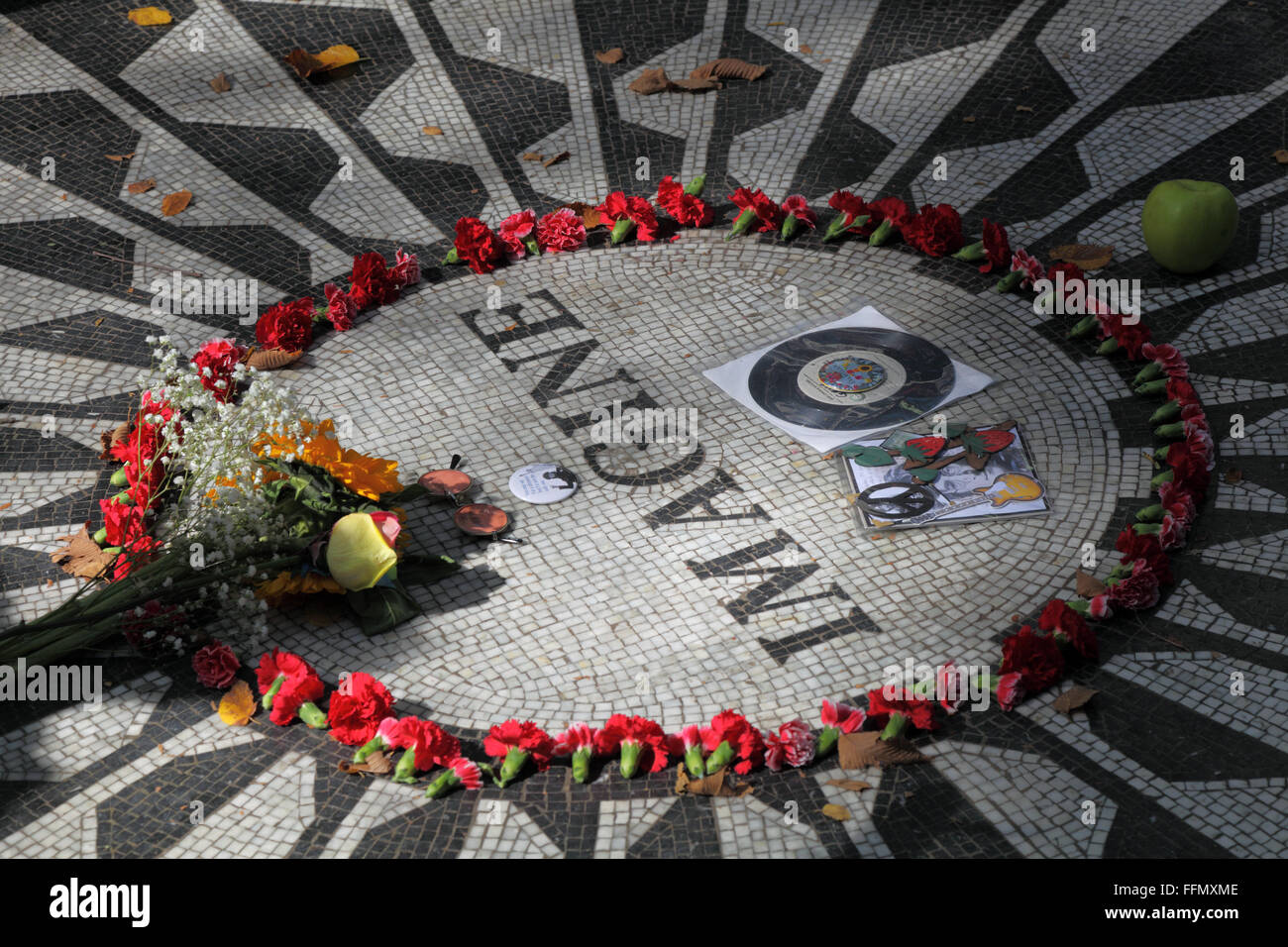 John Lennon, band playing The Beatles, Strawberry Fields, Central Park, New York City, USA, Stock Photo