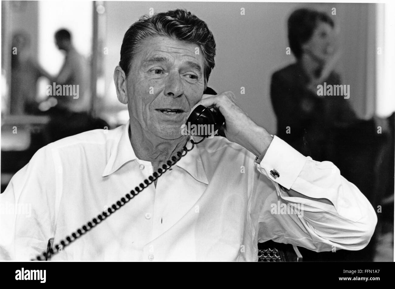Nov. 22, 2009 - Los Angeles, California, United States of America - United States President Ronald Reagan telephones various Members of Congress in Washington, D.C. from his room at the Century Plaza Hotel in Los Angeles, California regarding the budget on Saturday, July 25, 1981..Mandatory Credit: Bill Fitz-Patrick - White House via CNP (Credit Image: © Bill Fitz-Patrick/CNP via ZUMA Wire) Stock Photo