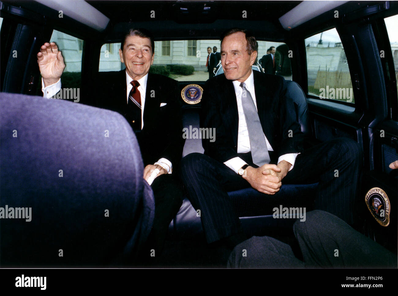 Jan. 20, 1989 - Washington, District of Columbia, United States of America - Washington, D.C. - January 20, 1989 -- United States President Ronald Reagan and President-elect George H.W. Bush arrive at the United States Capitol in Washington, DC on January 20, 1989 after a limousine ride from the White House for Bush's inaugural ceremonies..Credit: White House via CNP (Credit Image: © White House/CNP via ZUMA Wire) Stock Photo