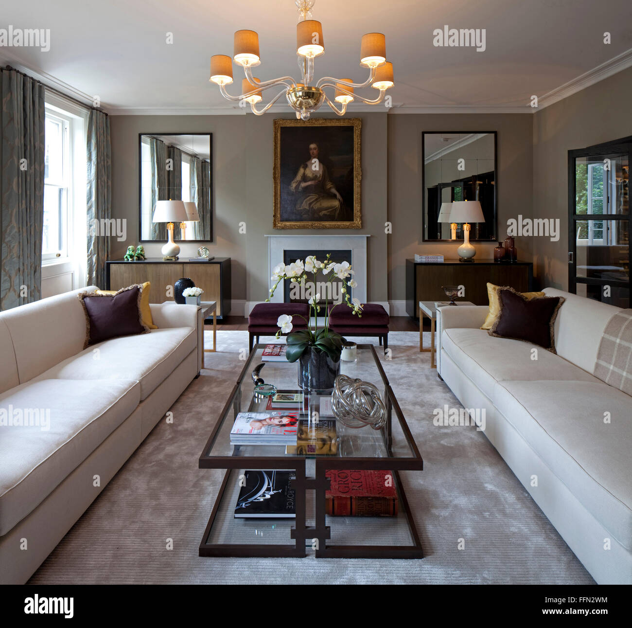 Knightsbridge Apartment, London. A sitting room, with large sofas and comfortable chairs. Stock Photo