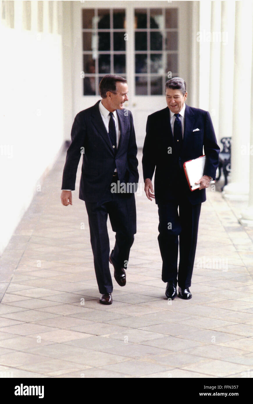 Washington, District of Columbia, USA. 3rd May, 1988. Washington, DC - May 3, 1988 -- United States President Ronald Reagan and Vice President George H.W. Bush walk on the Colonnade at the White House in Washington, DC on May 3, 1988.Credit: White House via CNP © White House/CNP/ZUMA Wire/Alamy Live News Stock Photo