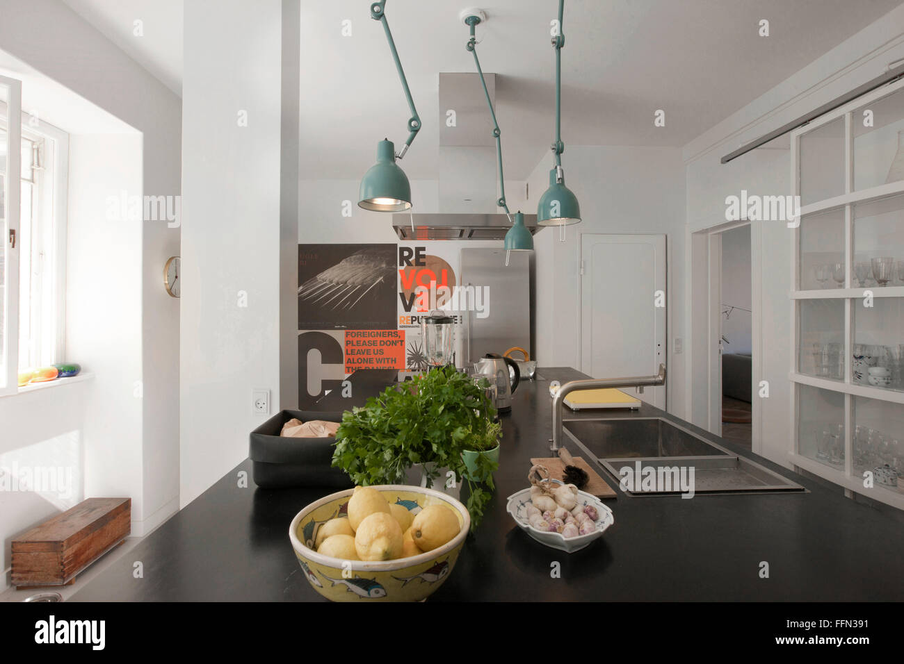 Modernism in the 'Cake House'. A minimalist kitchen and seating area. Stock Photo