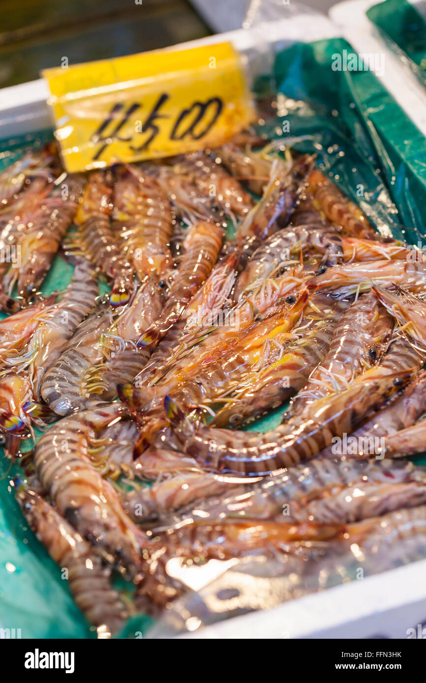 Raw seafood selling on market in Japan Stock Photo Alamy