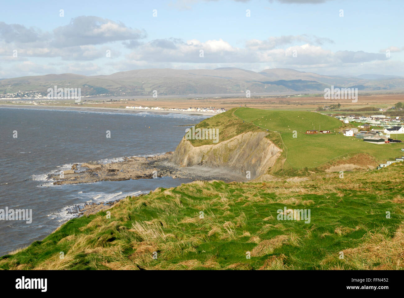 View of Borth and mountains beyond on the Ceredigion coastal path. Stock Photo