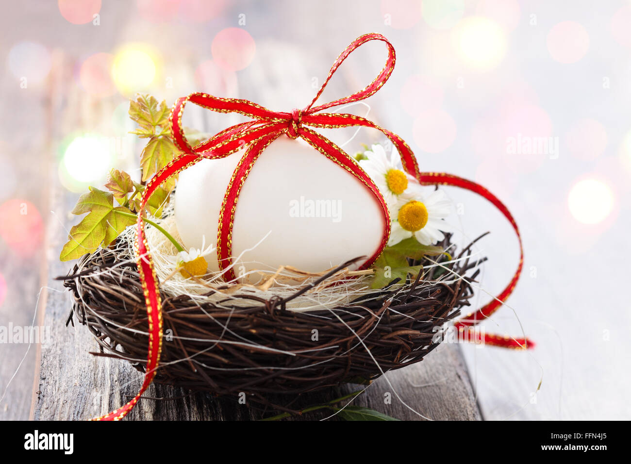 White egg in nest Stock Photo Alamy