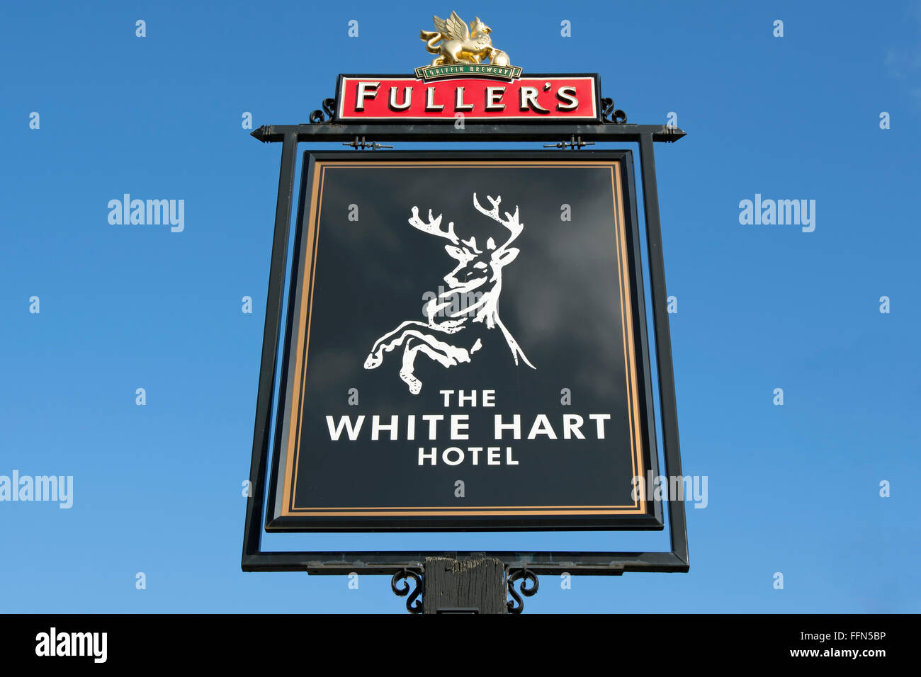 pub sign for the white hart hotel, owned by fuller's brewery, hampton wick, england Stock Photo