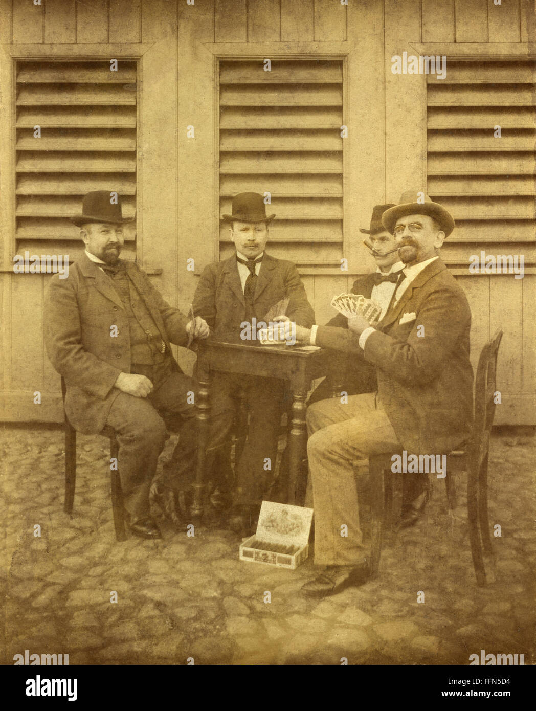 game, card game, four men playing sheepshead and smoking cigars, Bavaria, Germany, circa 1898, Additional-Rights-Clearences-Not Available Stock Photo