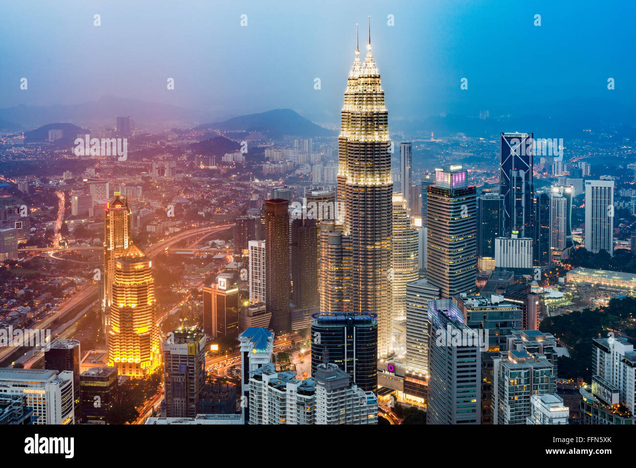 Aerial view of Kuala Lumpur city with the Petronas Towers, Malaysia, Southeast Asia at night Stock Photo