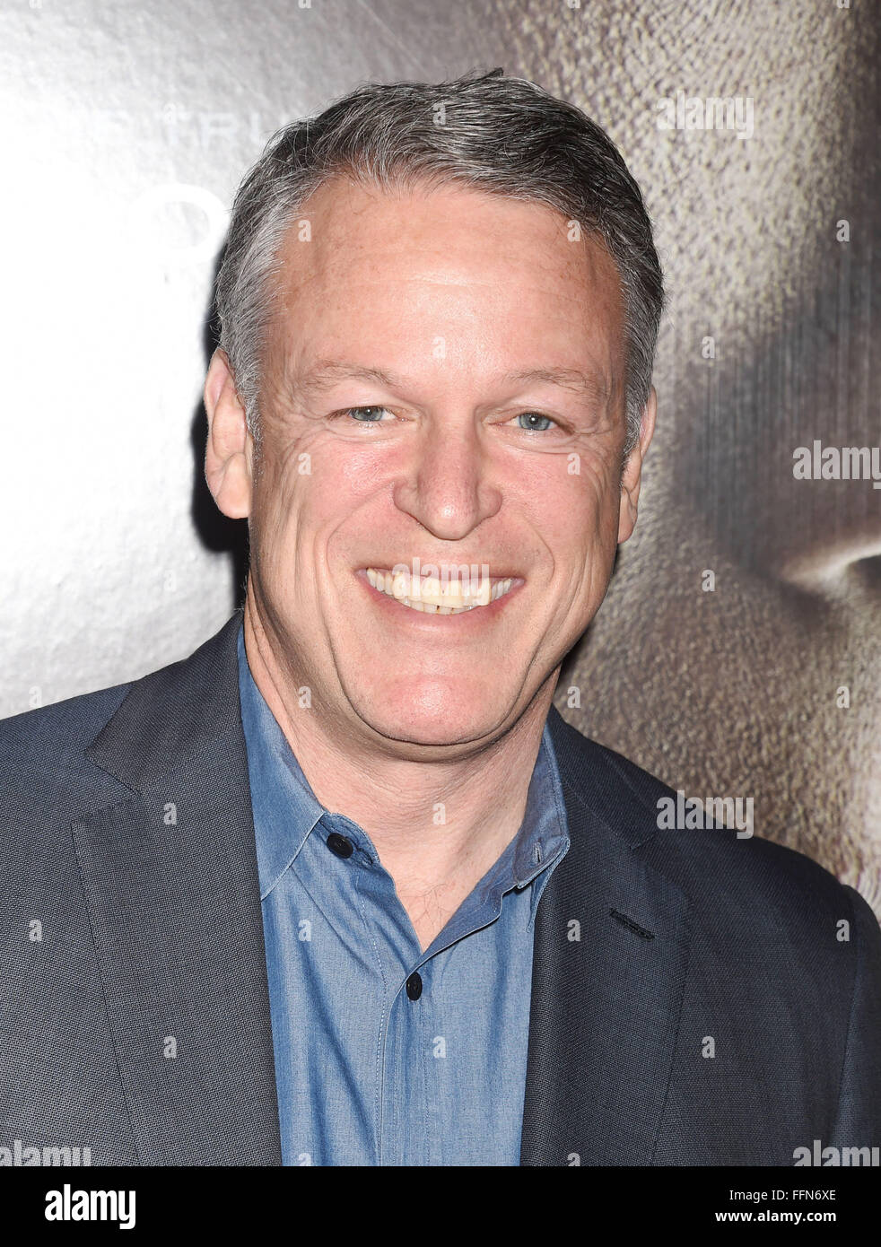 Producer Larry Shuman attends the screening of Columbia Pictures' 'Concussion' at the Regency Village Theater on November 23, 2015 in Westwood, California., Stock Photo