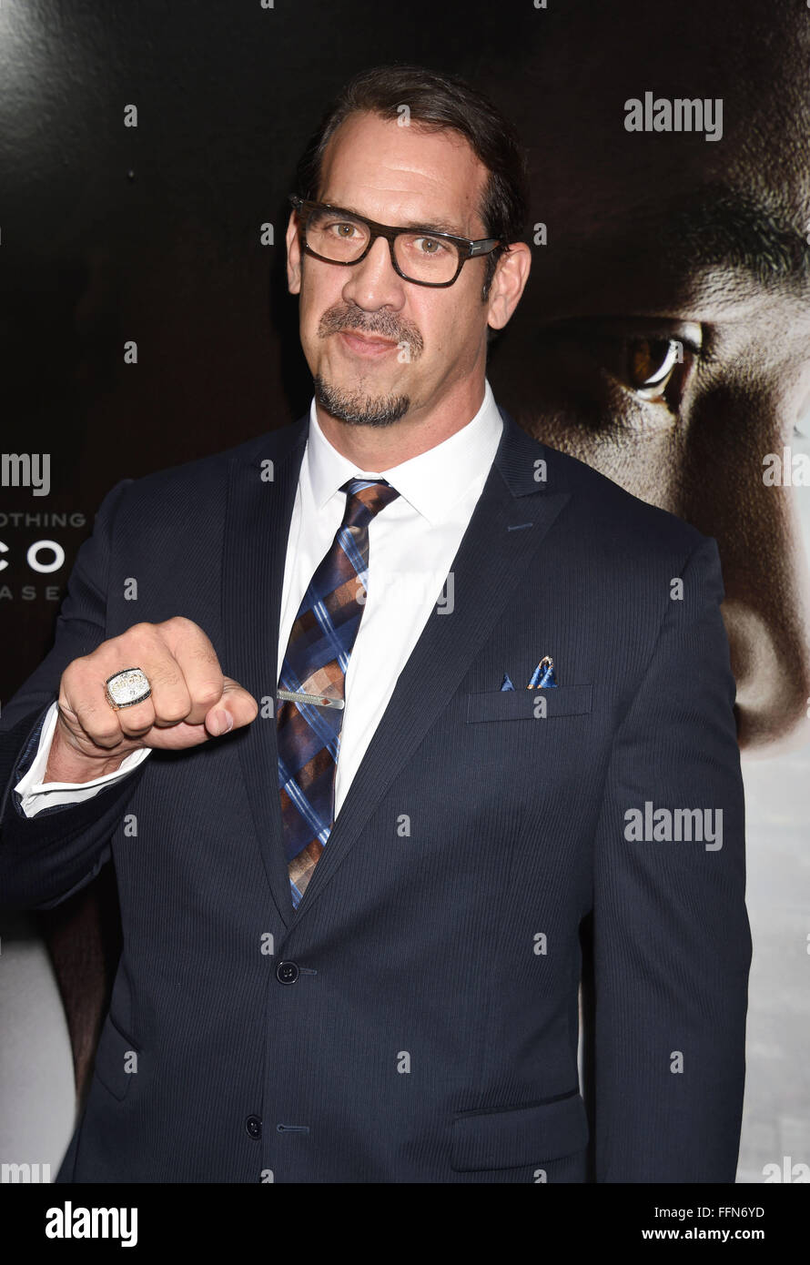 Actor/former NFL player Matthew Willig attends the screening of Columbia Pictures' 'Concussion' at the Regency Village Theater on November 23, 2015 in Westwood, California., Stock Photo