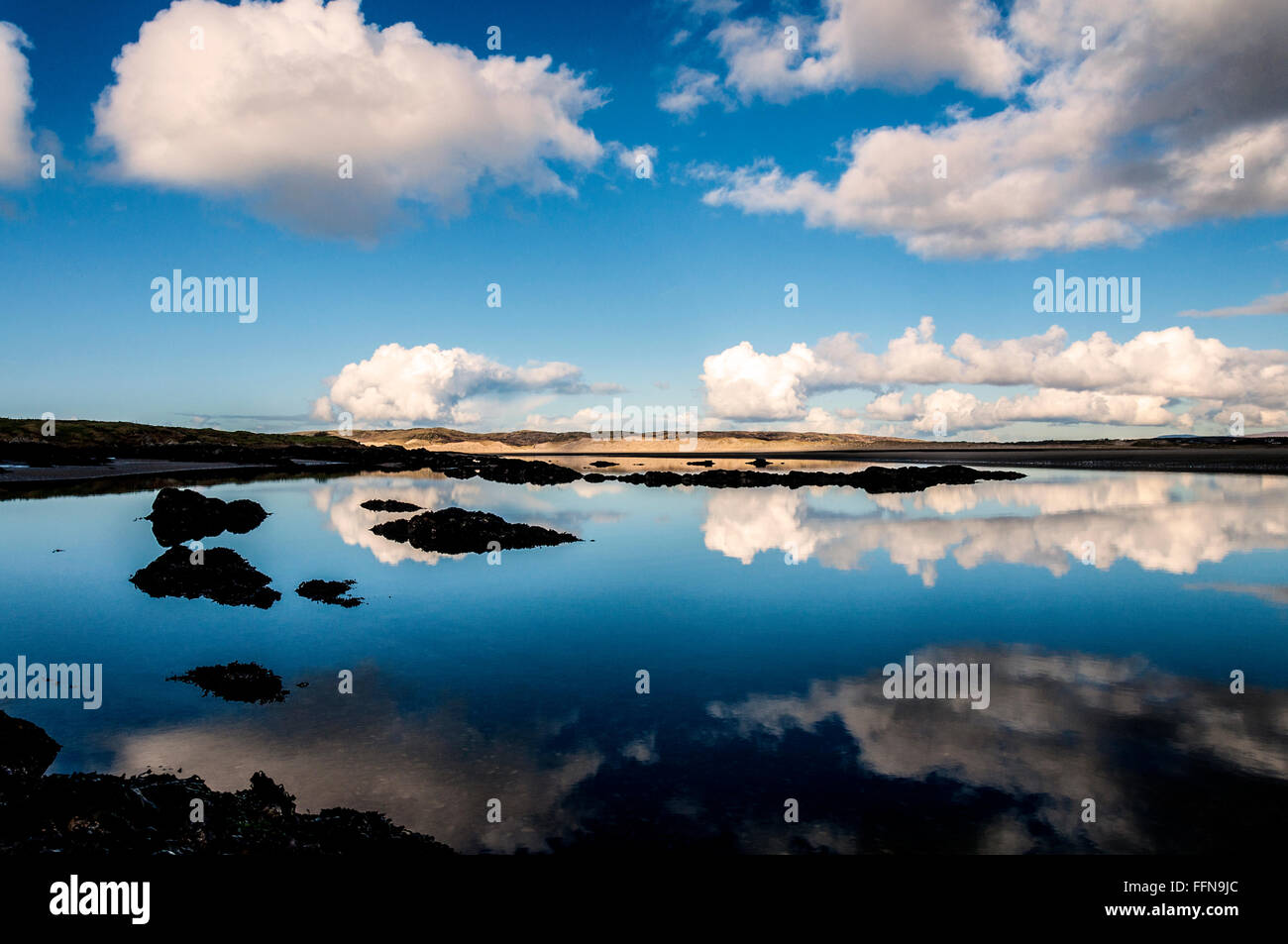 Wild Atlantic Way at Ardara, County Donegal Ireland. Surreal cloud meets calm ocean Stock Photo