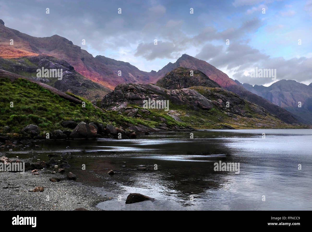 loch coruisk and mountain in cuillins with reflections & jagged skyline Stock Photo