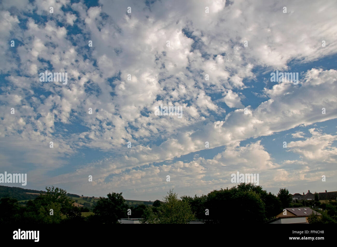 Altocumulus cloud invading from the southwest over Bradninch, Devon Stock Photo