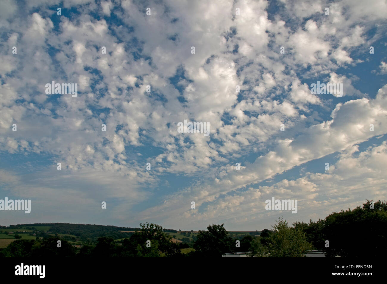 Altocumulus cloud invading from the southwest over Bradninch, Devon Stock Photo