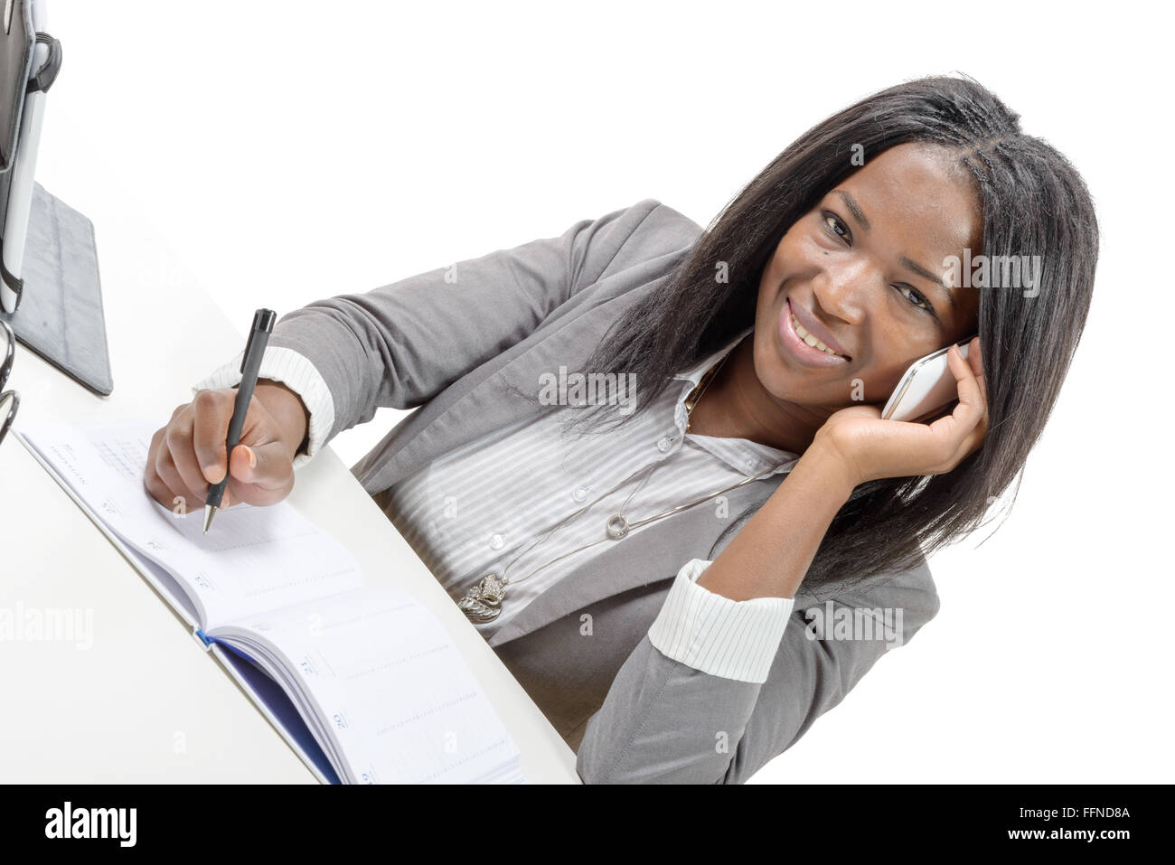 an african american business woman smiling on phone Stock Photo - Alamy
