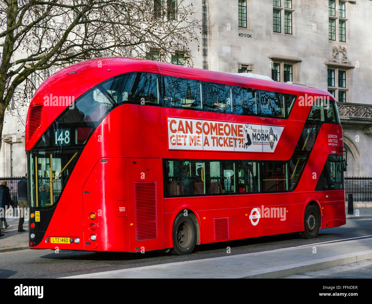 Modern red double-decker London bus, Central London, England, UK Stock Photo