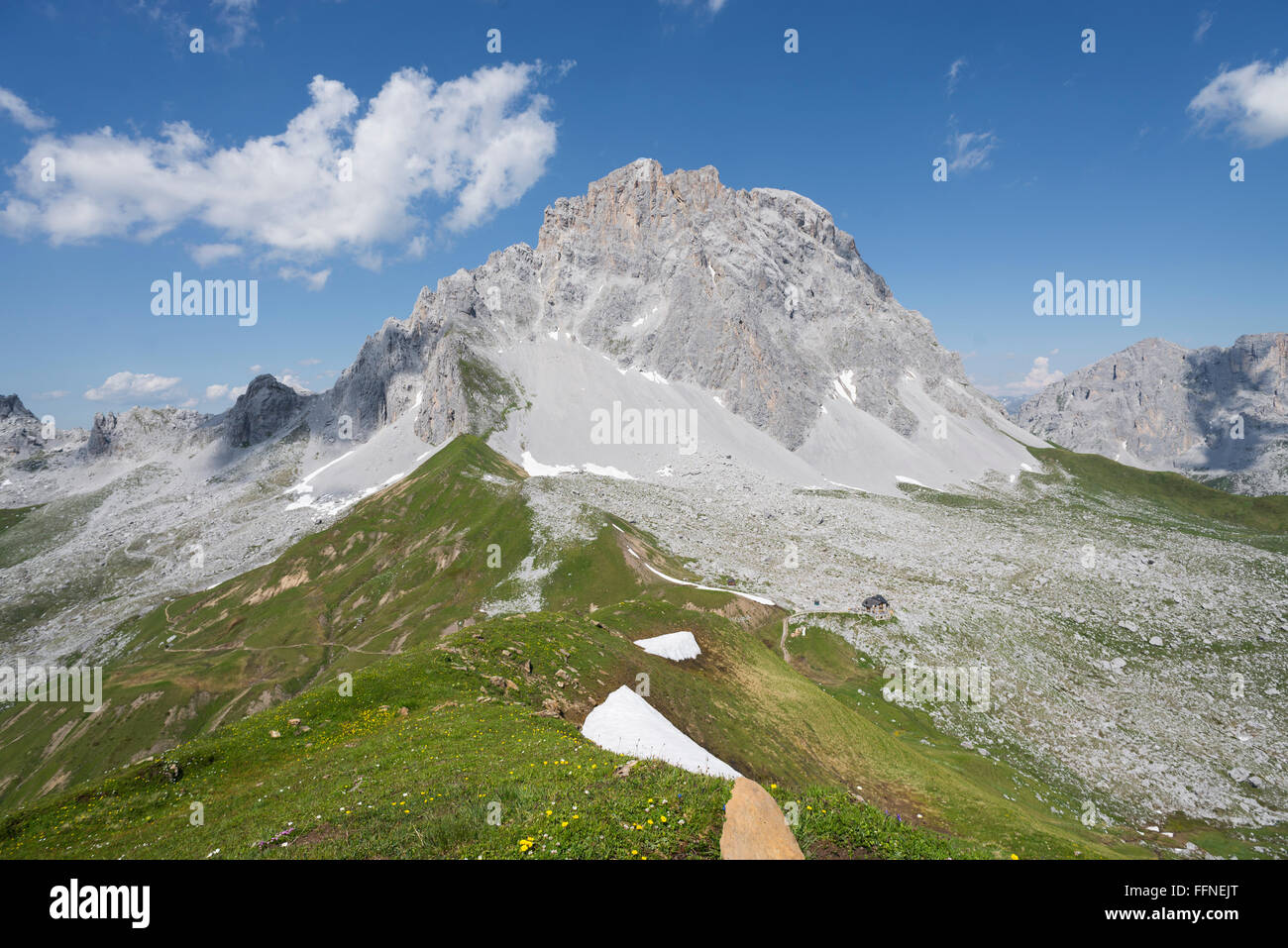The Carschina mountain hut in in front of the rock face of Mount Sulzfluh,  Canton Grisons,Switzerland, in summer Stock Photo - Alamy