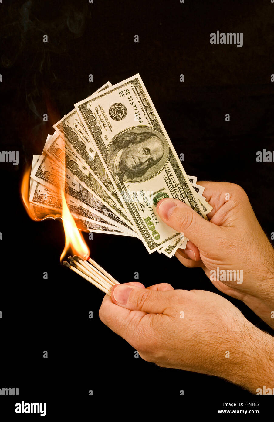 Money to Burn 1. A man uses matches to set fire to a group of one