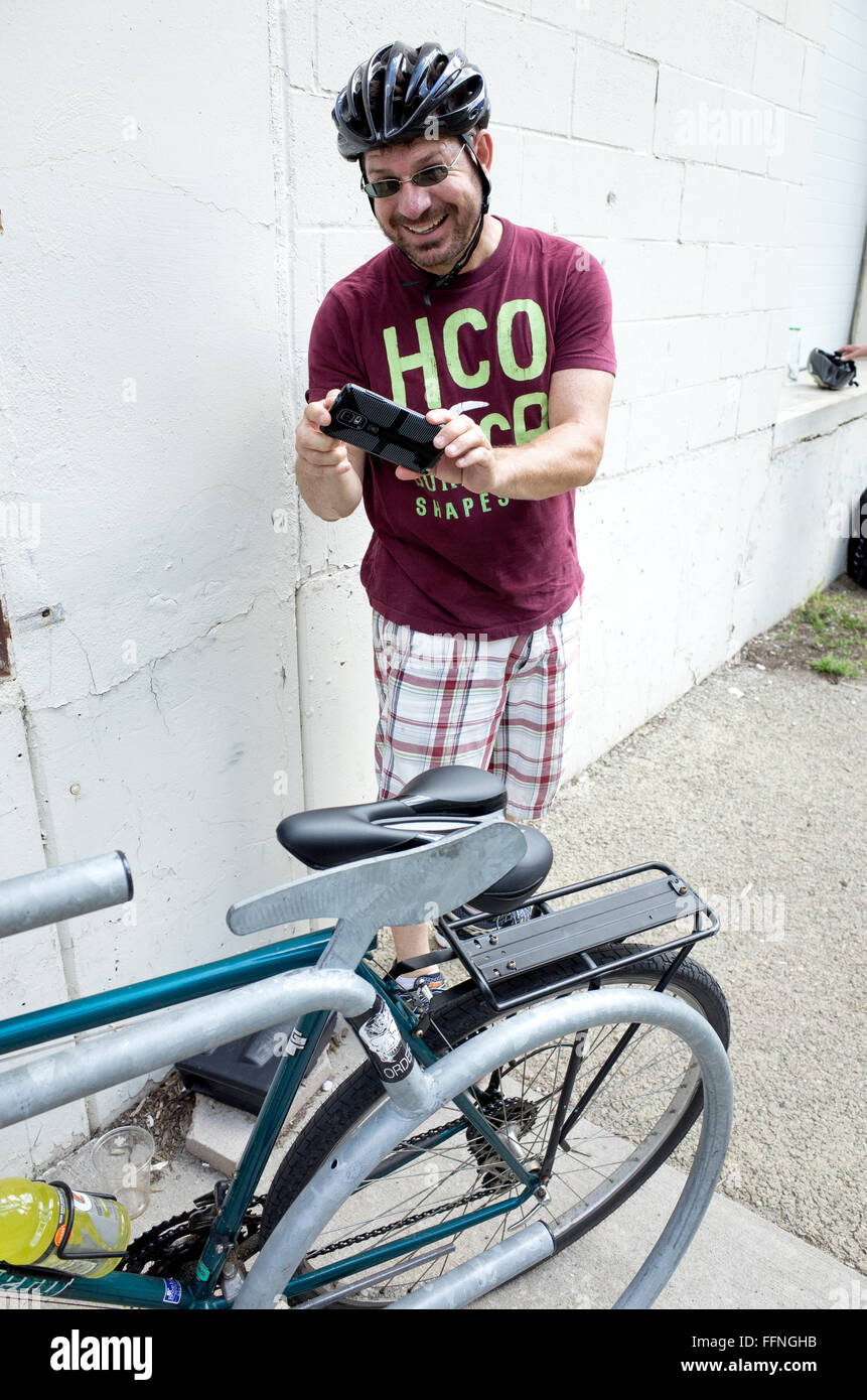 Man photographing my bicycle seat with large gap to preserve nerves in the  crotch area. Minneapolis Minnesota MN USA Stock Photo - Alamy