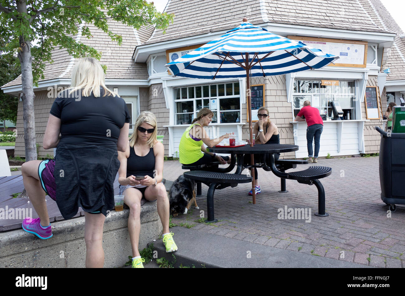 People taking a break at the Lake Harriet Bread and Pickle restaurant. Minneapolis Minnesota MN USA Stock Photo