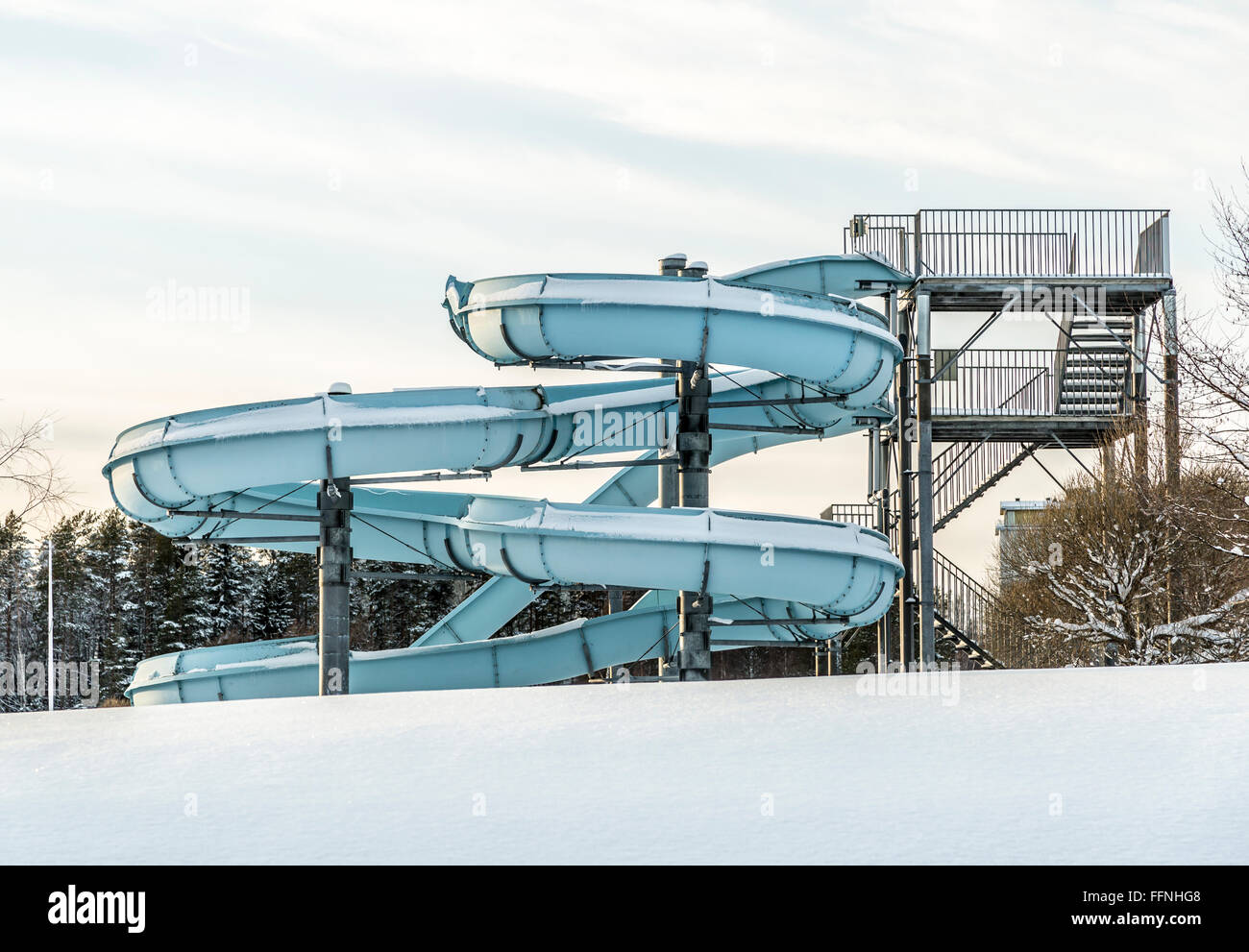 Water Slide in Winter with Snow Stock Photo
