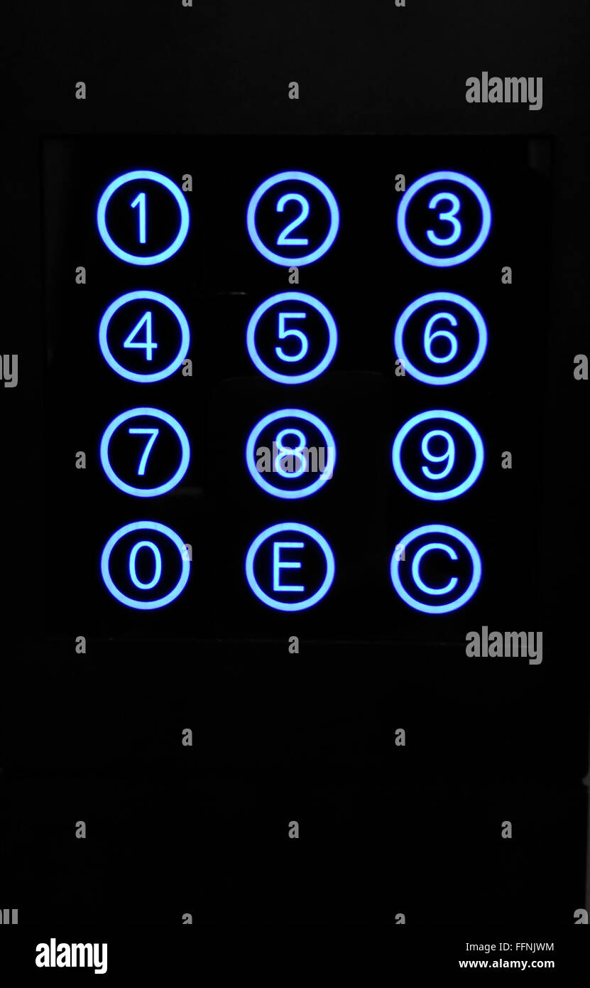 Numeric keypad with blue circular buttons Stock Photo