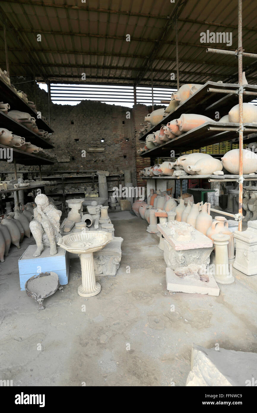 Stored artifacts in the Granai del Foro, Forum Granary, Pompeii, the Roman city buried in lava near Naples city, UNESCO World Stock Photo