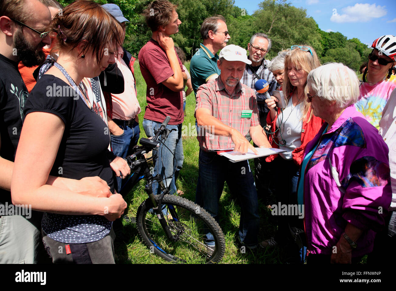 guided bike-tour GRUENES BAND near Volzendorf, Wendland, former border to DDR, Lower Saxony, Germany, Europe Stock Photo