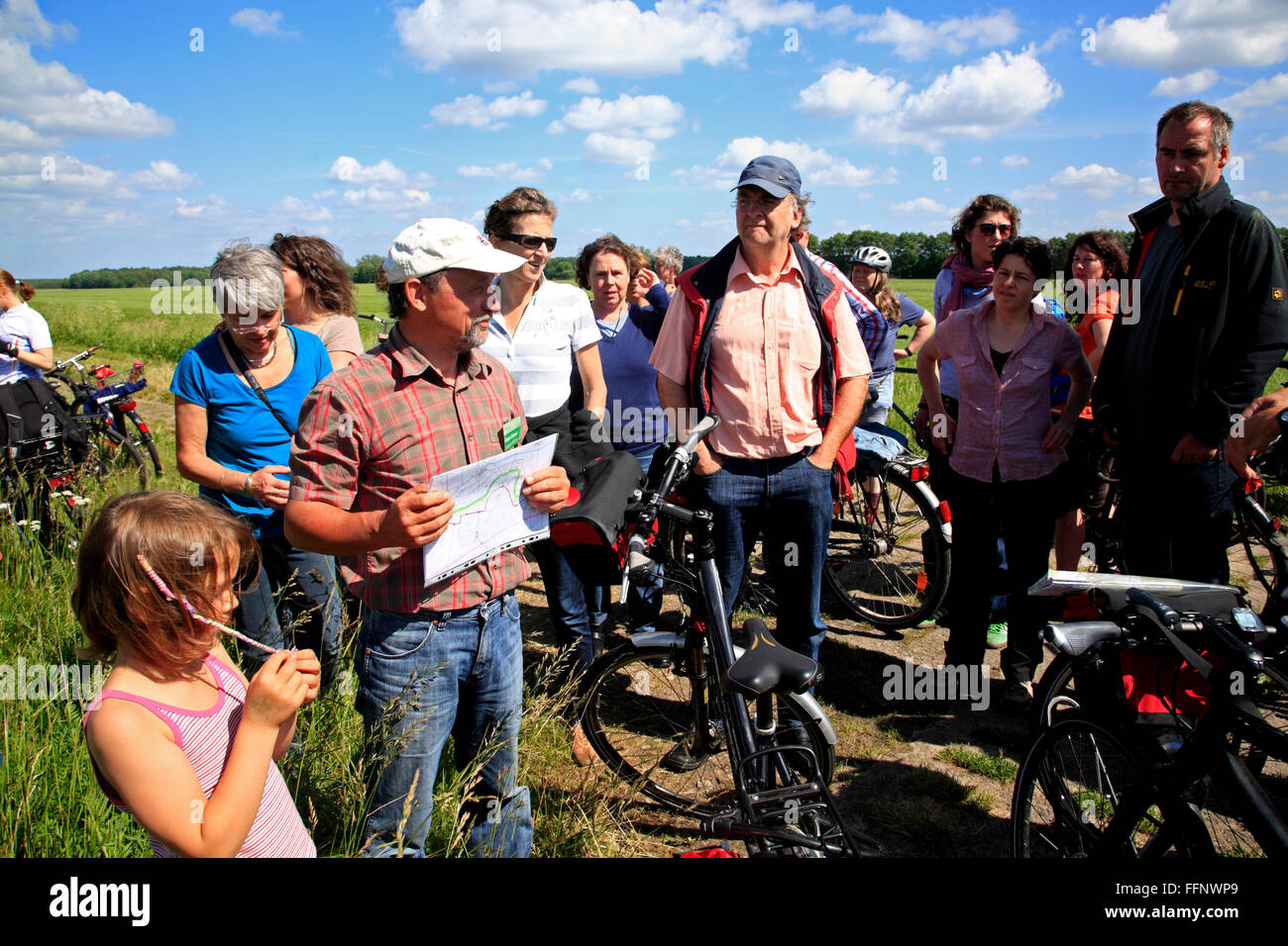 guided bike-tour GRUENES BAND near Volzendorf, Wendland, former border to DDR, Lower Saxony, Germany, Europe Stock Photo