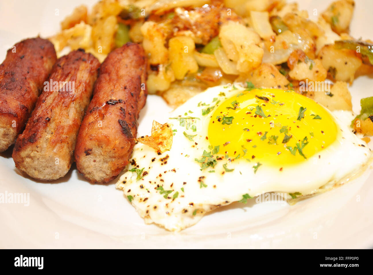 Eggs, Sausage and Hashbrowns for a Delicious Breakfast Stock Photo