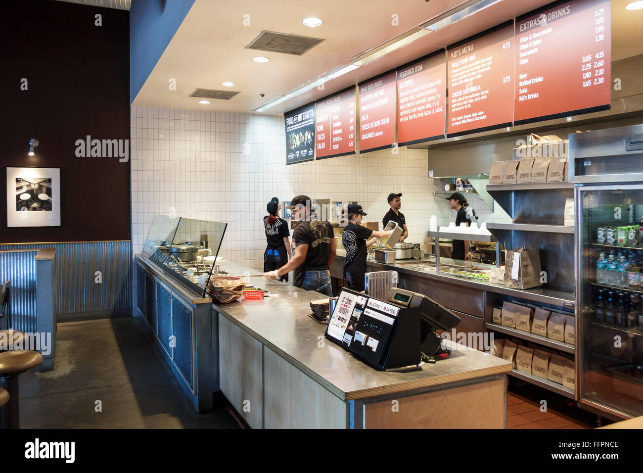 Florida South,Port St. Saint Lucie,Chipotle,restaurant restaurants food dining cafe cafes,Mexican,food,interior inside,counter,employees,FL151209002 Stock Photo