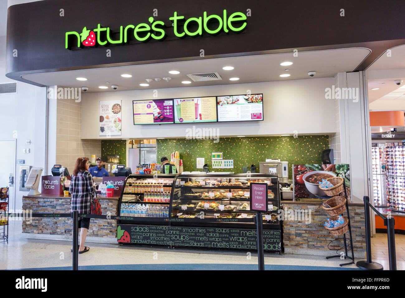 Florida South,Canoe Creek,Service Plaza,rest stop,interior inside,food court plaza,Nature's Table,counter,customer,FL151214022 Stock Photo