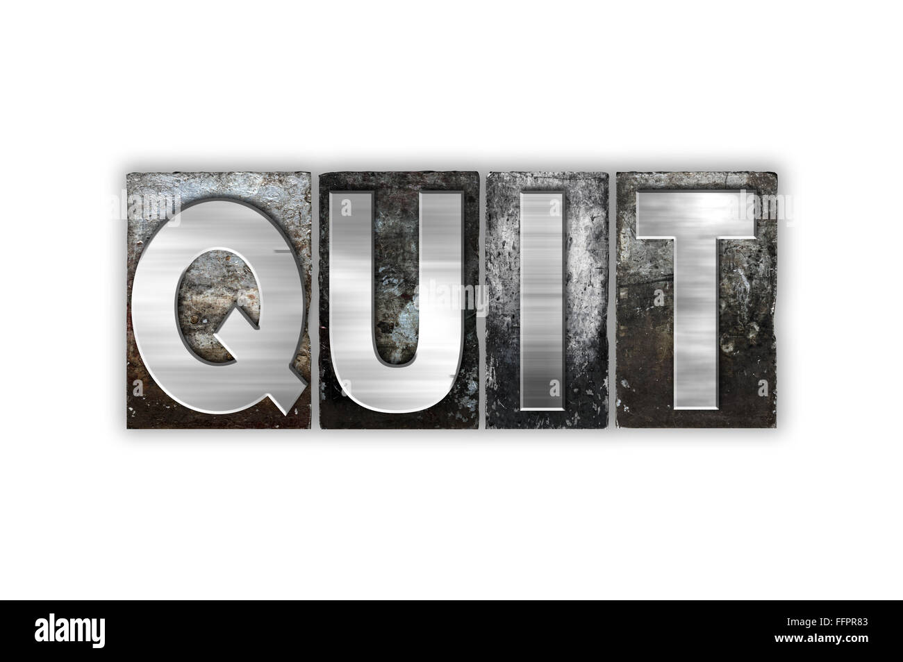 The word "Quit" written in vintage metal letterpress type isolated on a