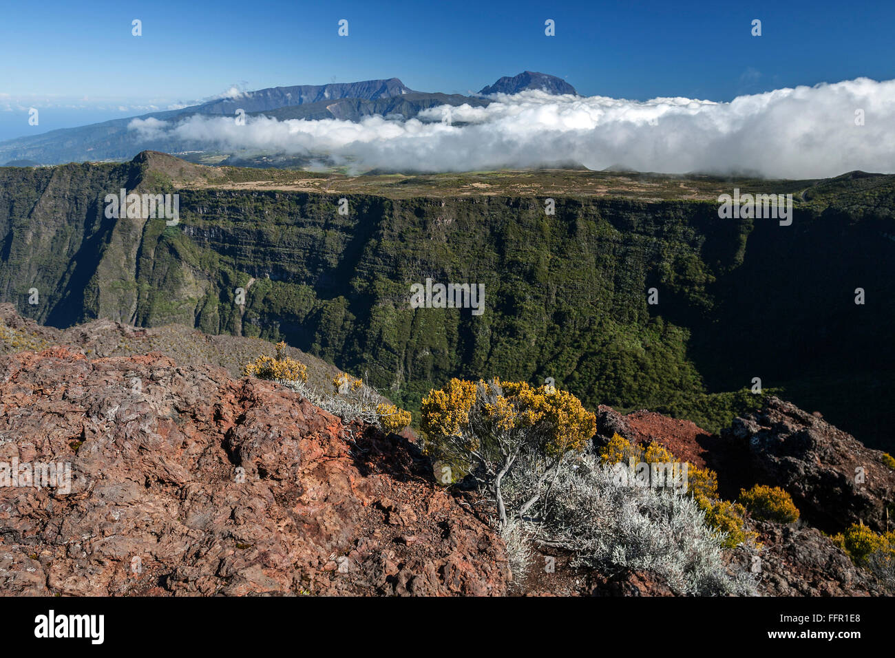 Landscape with clouds on the Route du Volcan, behind the mountain Piton