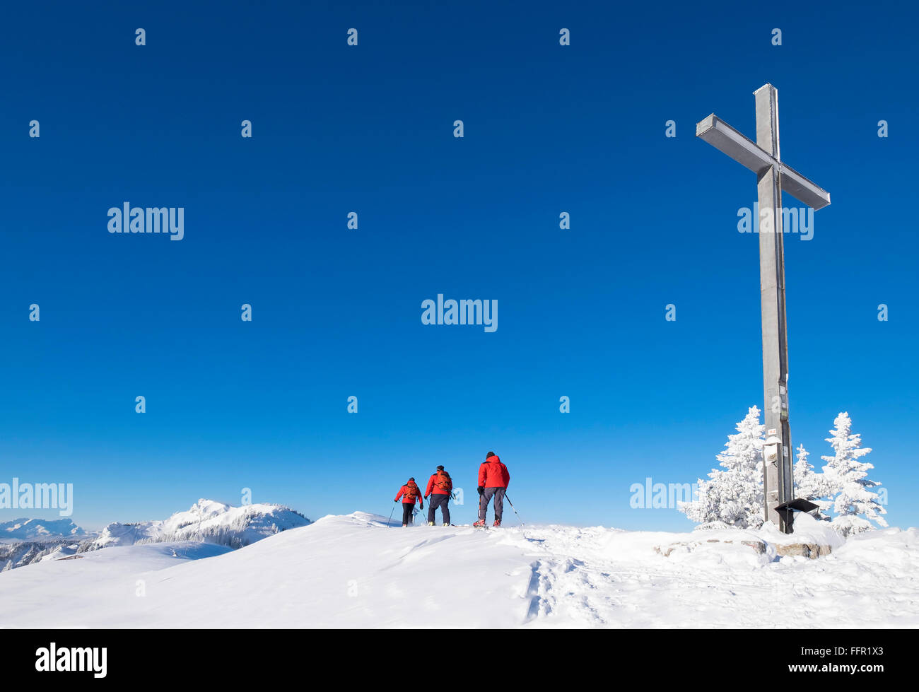 Ski tourers at summit, Brauneck, Lenggries, Isarwinkel, Bavarian Prealps, Upper Bavaria, Bavaria, Germany Stock Photo