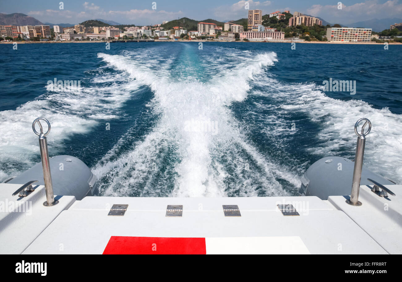 tail of fast motor boat departures port of Ajaccio, Corsica, France