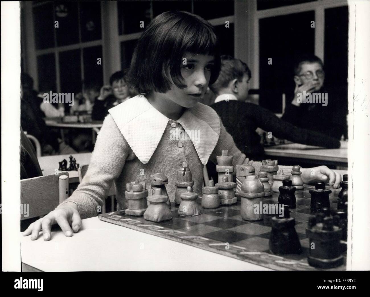 1964 - How's She Going To Reply To That Move.? Maureen Sharpe, having made her move, wonders how her opponent will counter it. Maureen has an unbeaten record against her own parents, and is placed 5th amongst the 35 players in the Langbourne Primary School. © Keystone Pictures USA/ZUMAPRESS.com/Alamy Live News Stock Photo