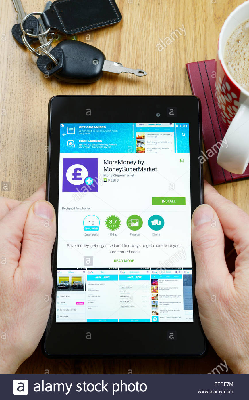 money supermarket app on an android tablet pc dorset england uk FFRF7M