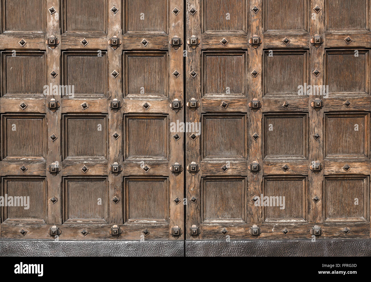 Old carved entrance door to Cathedral Stock Photo