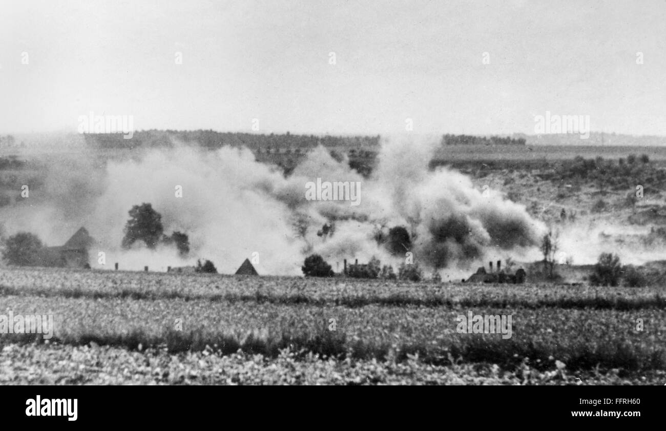 DESTRUCTION OF LIDICE, 1942. /nView of the village of Lidice, Czechoslovakia, during its destruction by Nazi forces on 11 June 1942, in reprisal for the assassination by Czech partisans of Reinhard Heydrich, German 'Reich protector' of Bohemia and Moravia Stock Photo