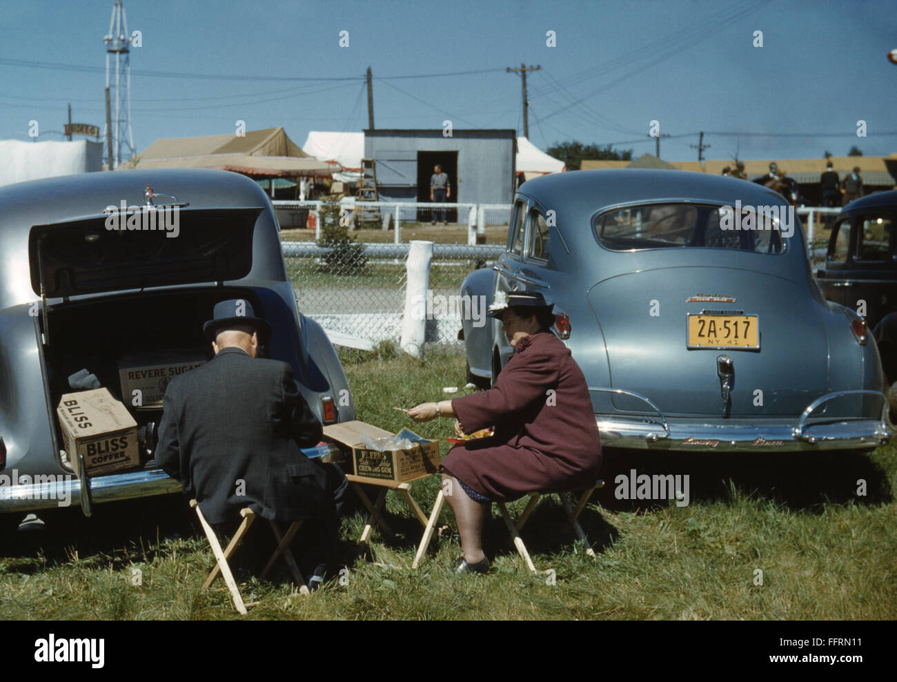 VERMONT STATE FAIR, 1941. /nCouple in the parking lot at the Vermont