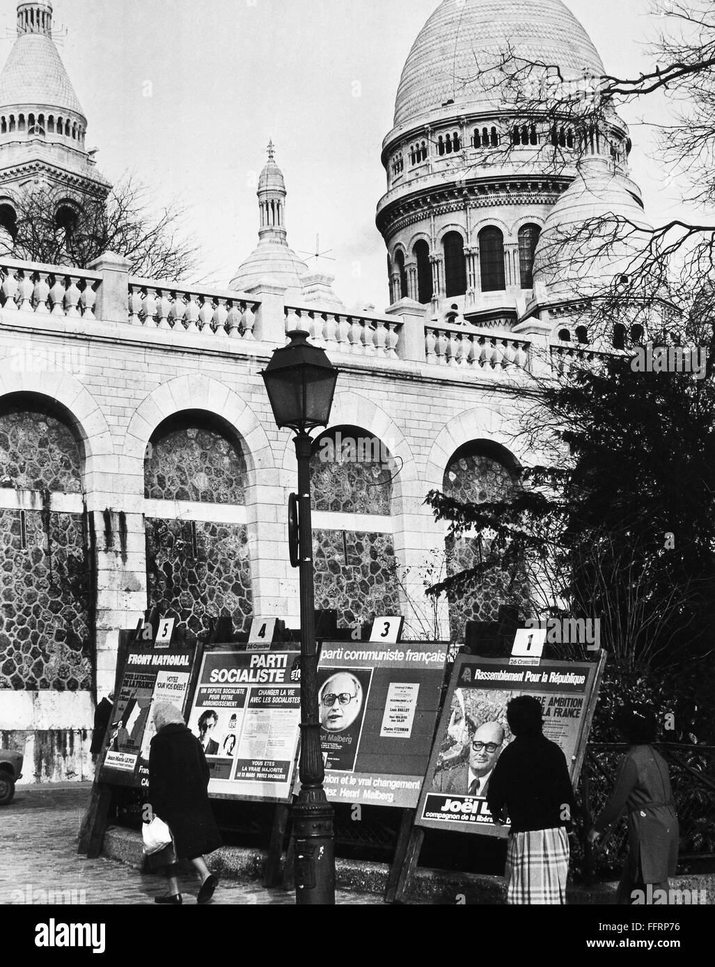 FRANCE: ELECTION, 1971. /nPolitical party posters for the national elections, March 1971, displayed evenly at Sacre Coeur Basilica in Montmartre, Paris. Stock Photo