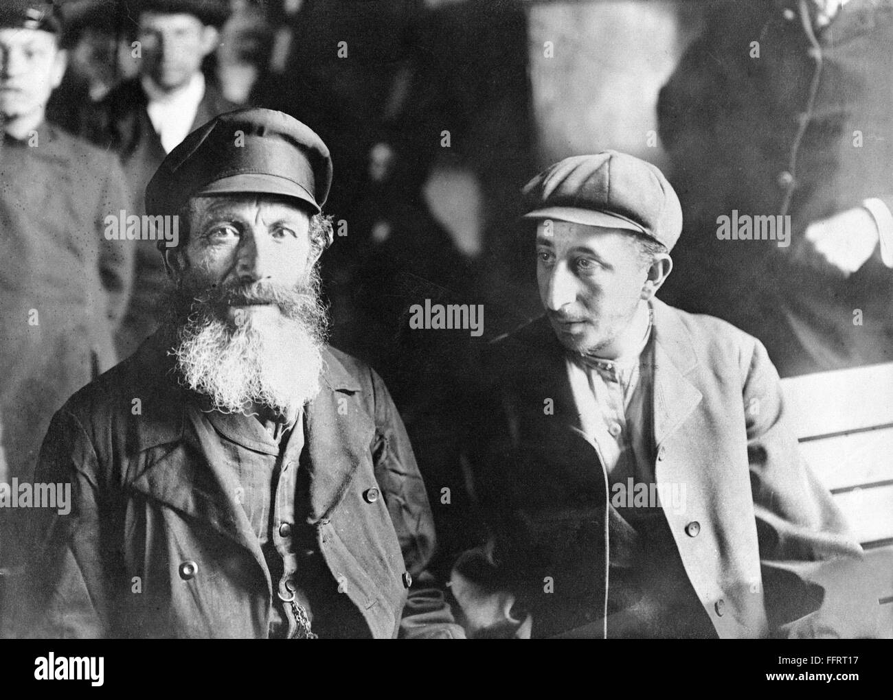 NEW YORK IMMIGRANTS. /nA European immigrant and his son, sitting on a