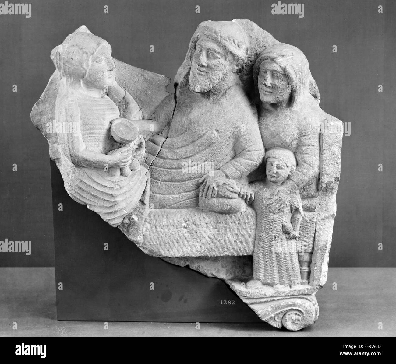 ANCIENT GREECE: FAMILY./nA family at a banquet. Tombstone. Limestone, Cypress, 4th century. Stock Photo