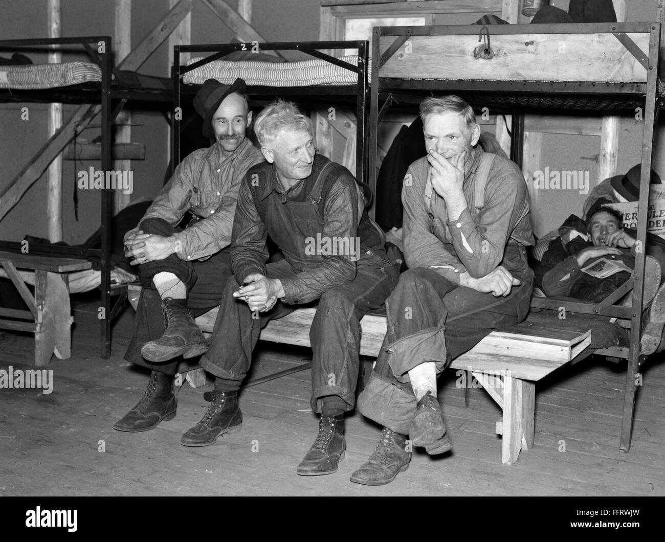 MINNESOTA LUMBER CAMP, 1937. /nLumberjacks in their bunkhouse after dinner at a lumber camp