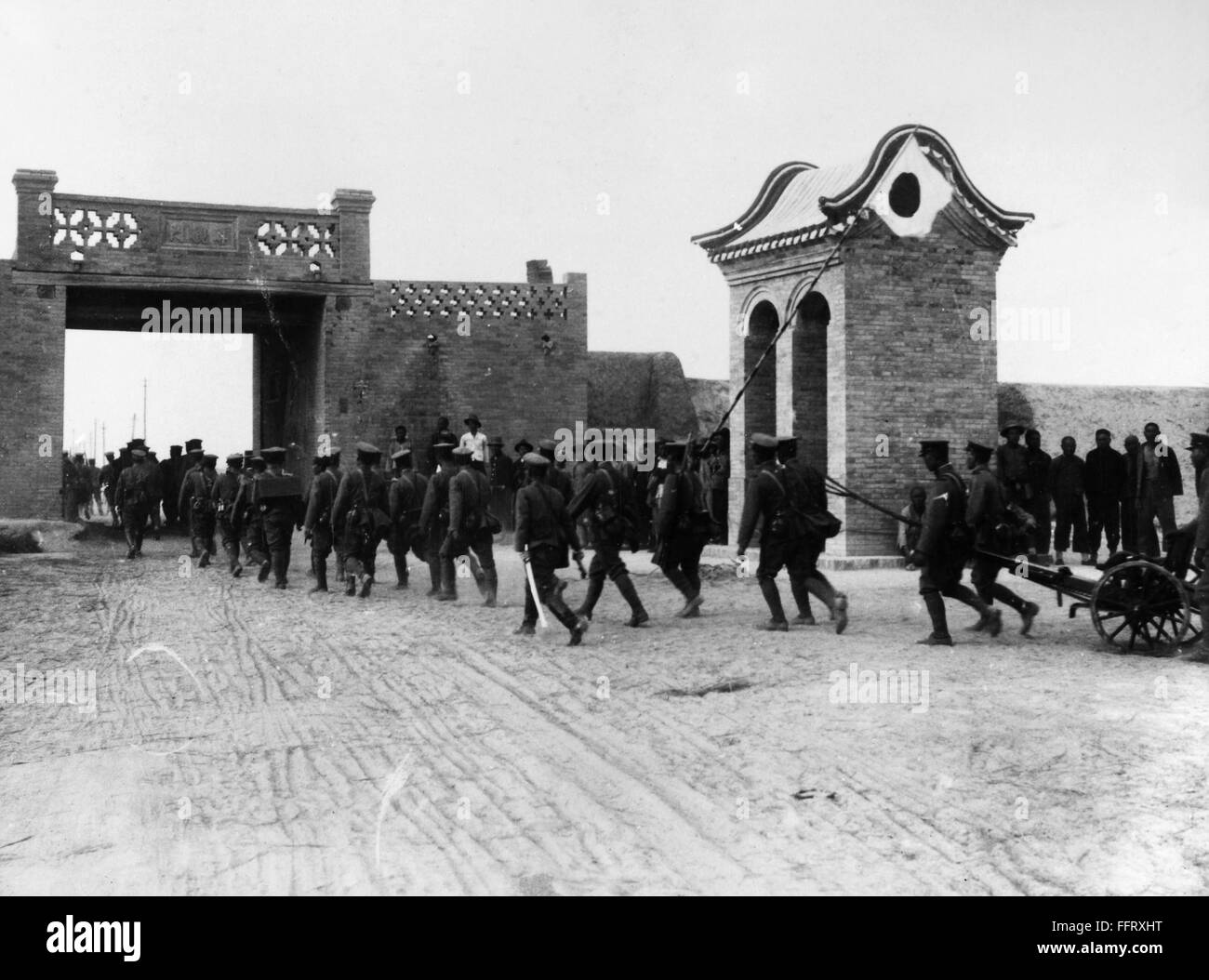 JAPAN MANCHURIA, 1931. /nJapanese troops entering the walled town of Taonan, terminus of a