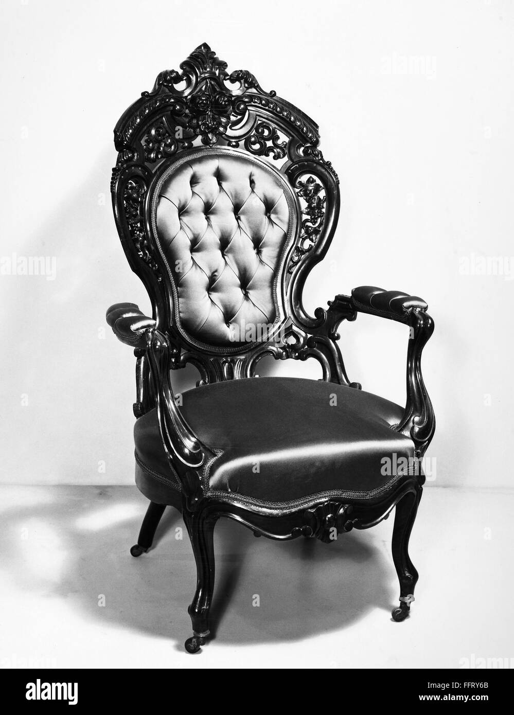VICTORIAN CHAIR, c1860. /nAmerican rosewood arm chair in Victorian