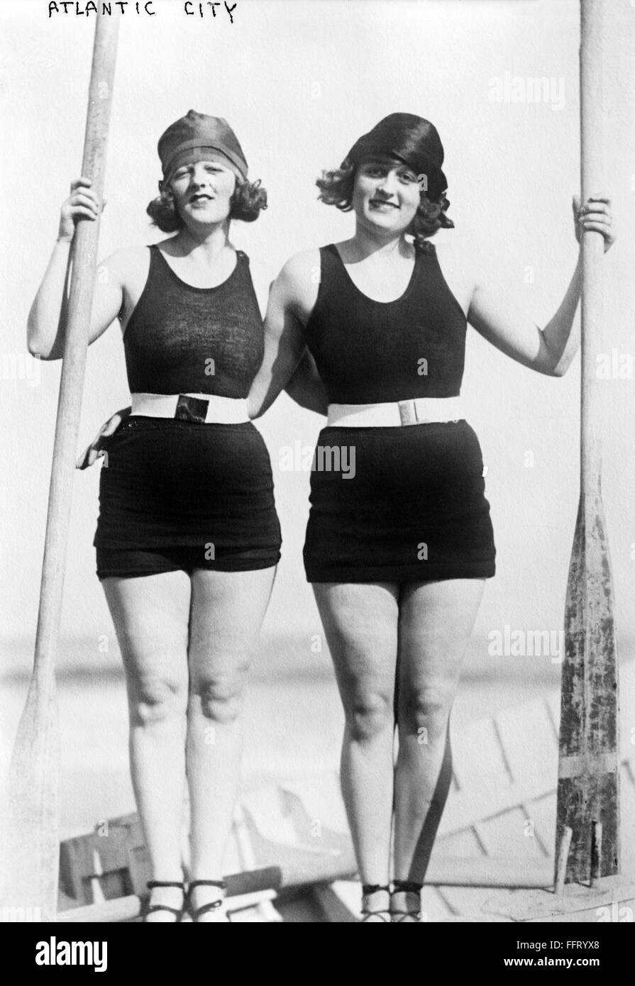 ATLANTIC CITY: WOMEN. /nTwo young women wearing swimsuits in a standing ...