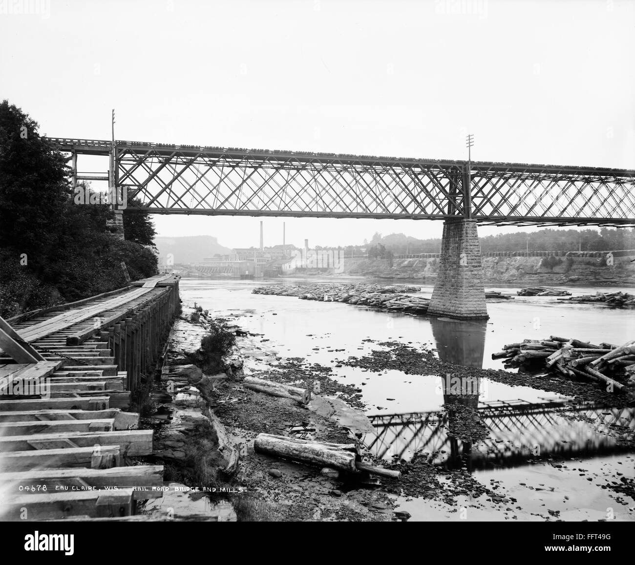 WISCONSIN LUMBER, c1890. /nRailroad bridge and lumber mill, Eau Claire